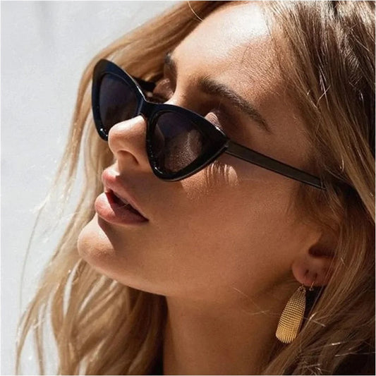 Close-up of a woman wearing the All Star Shady black cat-eye sunglasses